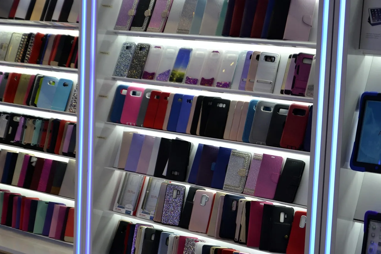 accessories, case, cell phone, phone, electronics, store, display, sale, technology, android, apple, iphone, tablet, mobile, smart phone, shelves, led, 2023, 2024, selection of phone covers, galleria mall, accessory, shelf, selection, array